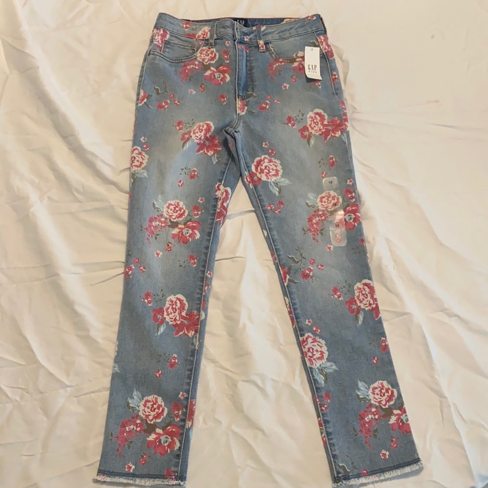 1 NWT floral detail Gap, 2 Rockets of Awesome, 1 black H&M and 1 Carter’s